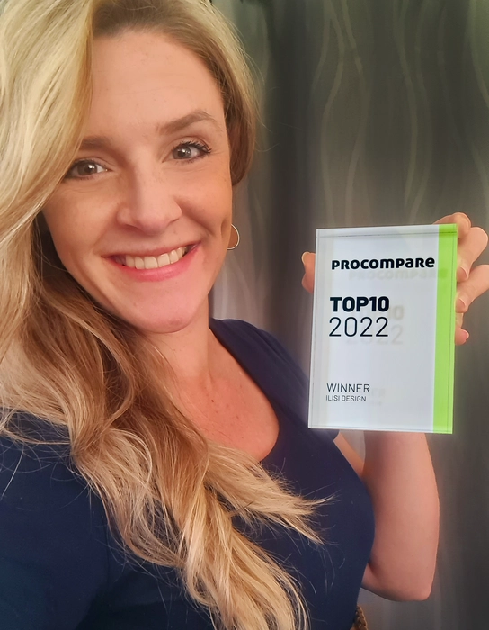 Ada-Marié Strydom from ILISI Interiors holding the Procompare