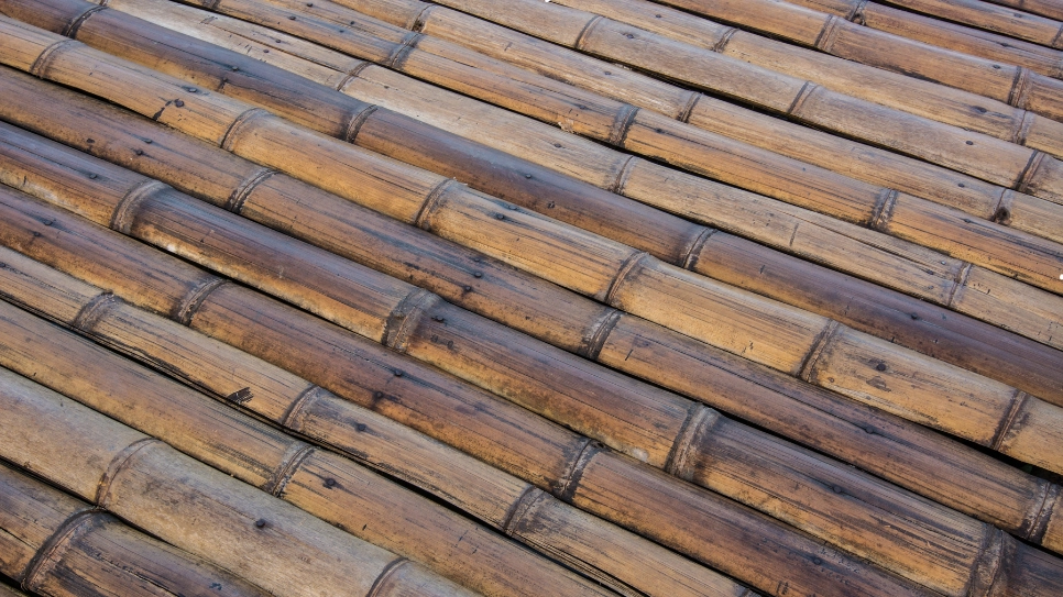 Detailed view of bamboo flooring panels, highlighting their natural texture and eco-friendly material for interiors.