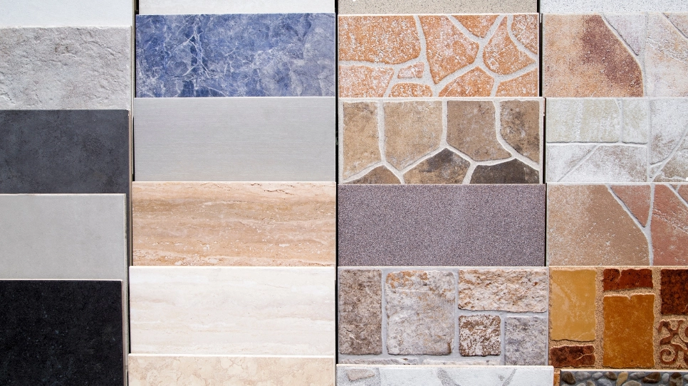 A variety of ceramic tiles featuring different textures and colors, suitable for walls and flooring projects.